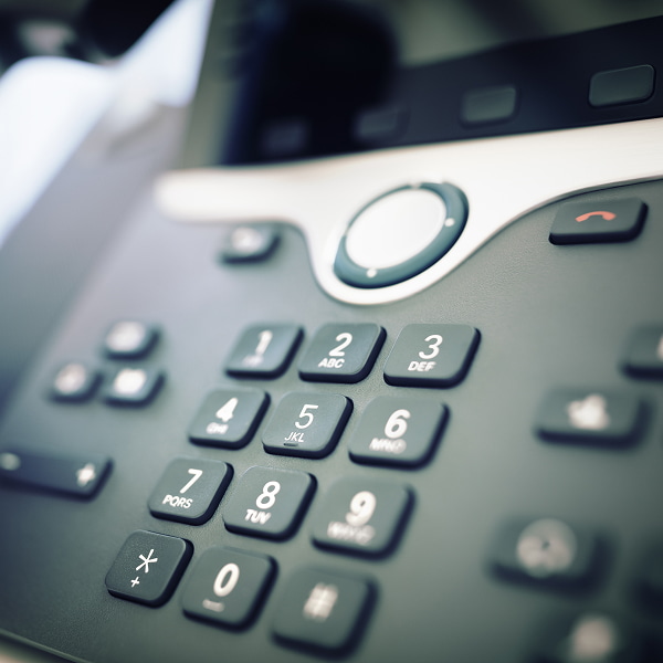 Dialing A Telephone In The Office