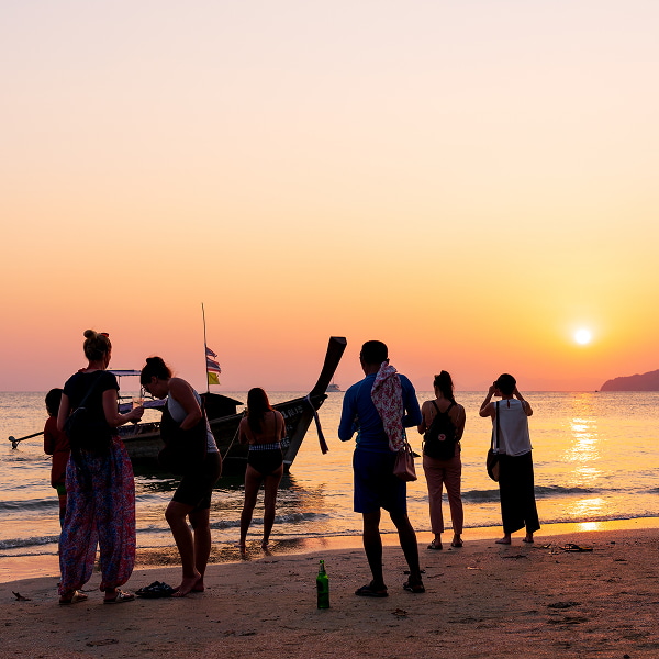 Sunset Sunset at the beach with a long tail boat