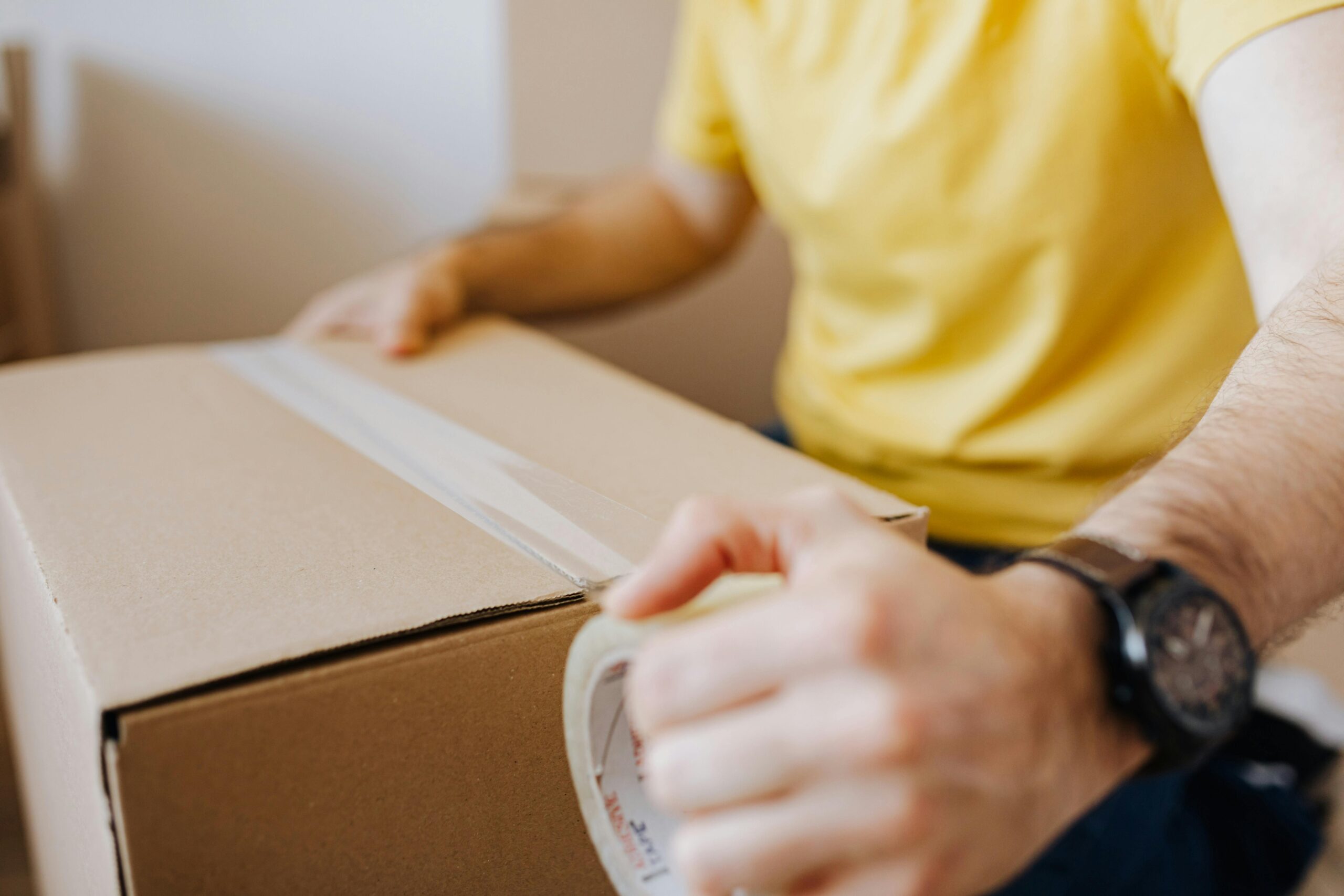 Packing a box ready to send via Thailand Post domestic shipping service