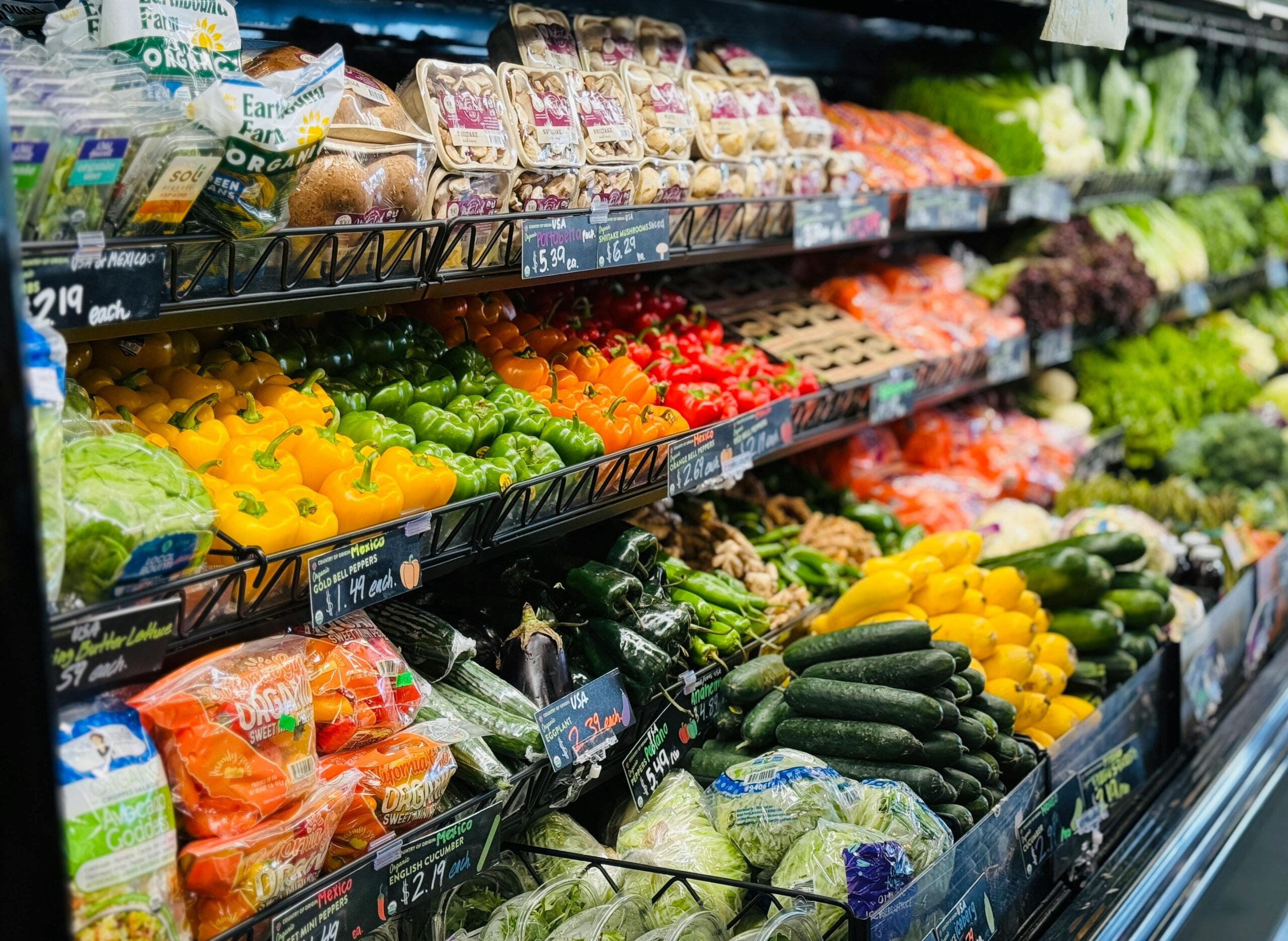 Fresh fruits and vegetables on display at a large wholesale supermarket in Phuket