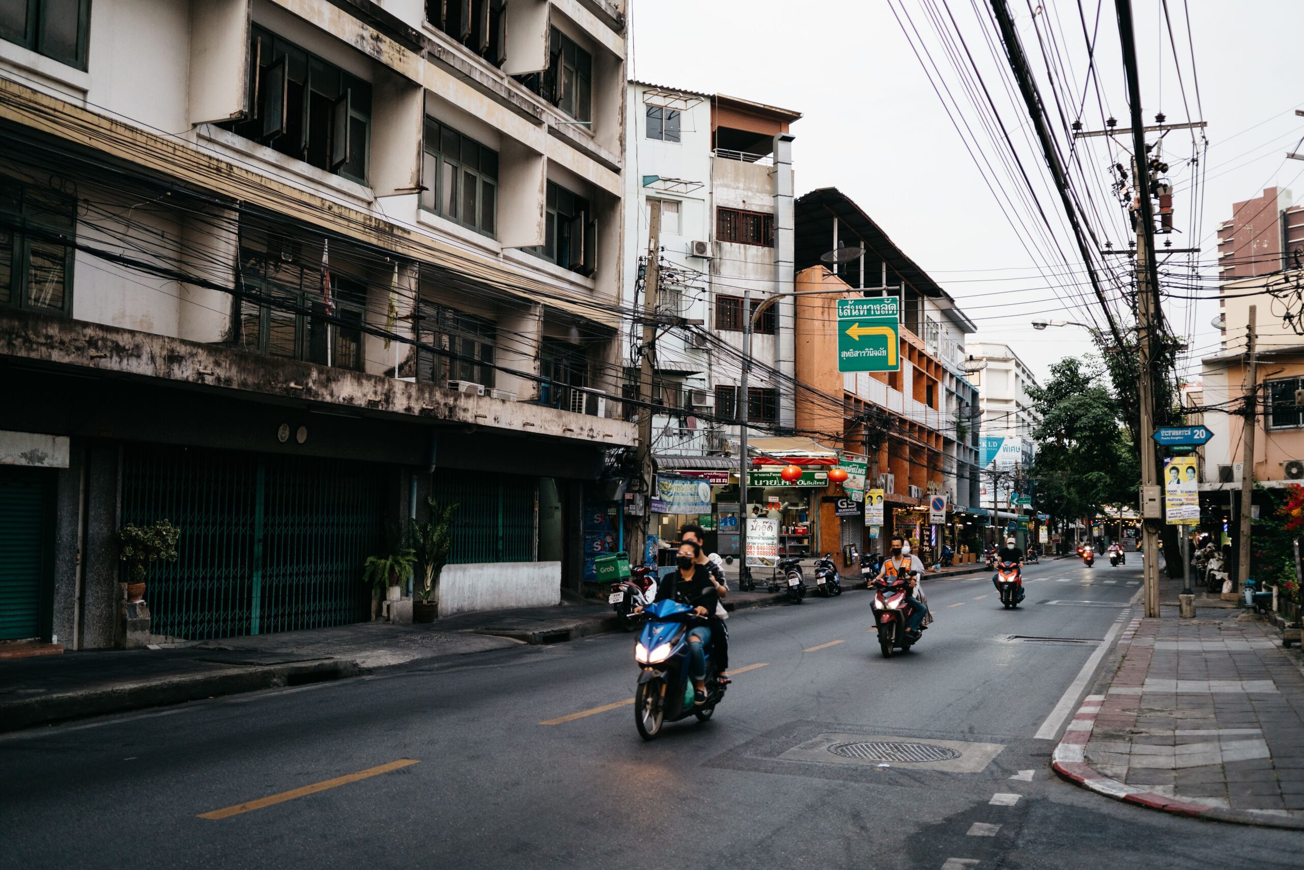 Taxi waiting on a Phuket street for an app-booked ride