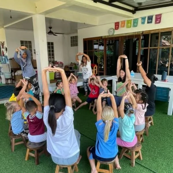 Shining Stars Kamala Preschool Outdoor Circle Time Stretching